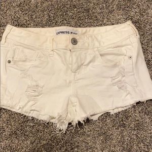 White distressed jean shorts